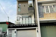 Nhà 1 trệt 2 lầu,mặt tiền kinh doanh, có gara ôtô, giá 6,9 tỷ