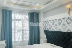 Bán nhà quận phú nhuận, 5 tầng, hxh, có sân đỗ trước nhà, sổ vuông vức đẹp.