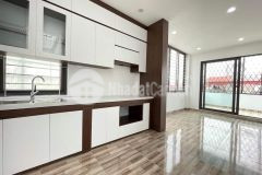 Bán nhà lạc long quân 5 tầng 56m2 ô tô vào nhà có sân riêng để ô tô lô góc kinh doan