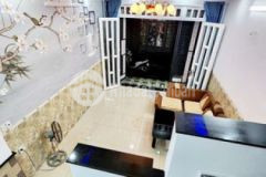 Bán nhà mới xây 2 lầu sân thượng hẻm thông 6m 4pn