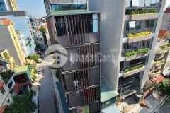 Bán tòa văn phòng lô góc lạc long quân 110m2 mt 12m thông sàn 36 tỷ