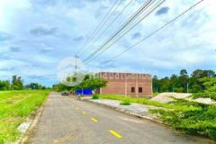 Đất sổ đỏ cạnh nhà đang xây mặt tiền quốc lộ