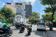 Bán tòa nhà 9 tầng mặt tiền 6m đào duy anh 156m2 có hầmt.máy dt 170tr sát sân bay 54 tỷ