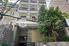 Bán tòa chdv lạc long quân 251m2 x 9t tầng hầm thang máy ngõ thông oto đỗ cổng